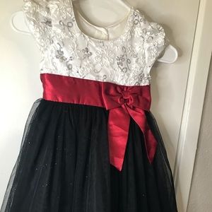 Formal dress size 5, white top, black tutu attached with a red satan belt